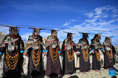 Villagers display folk costume in Pulan County, SW China’s Xizang